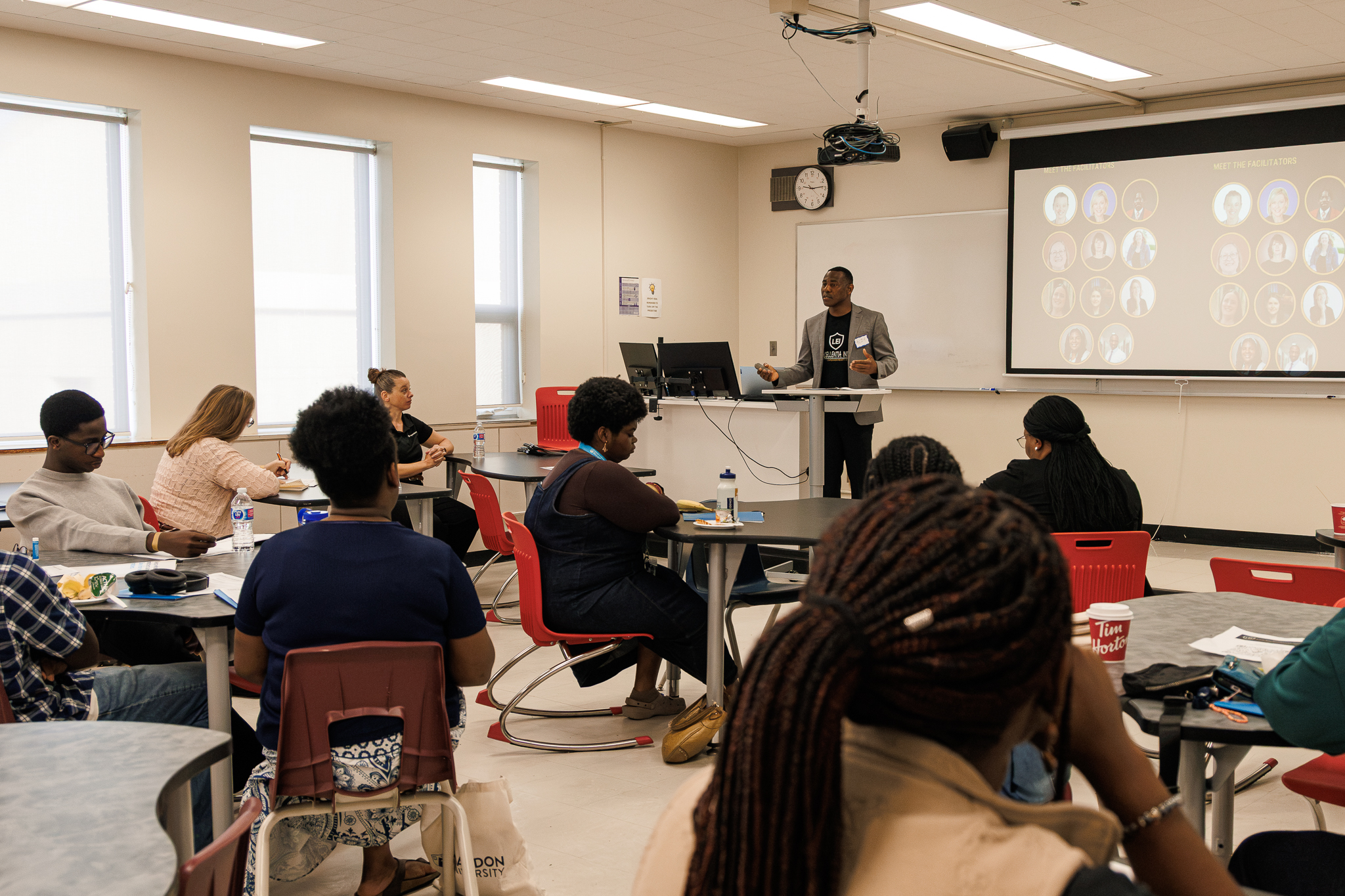 Dr. Aloysius C. Anyichie delivers opening remarks at the Loy Excellentia Beyond the Classroom professional development workshop at Brandon University.