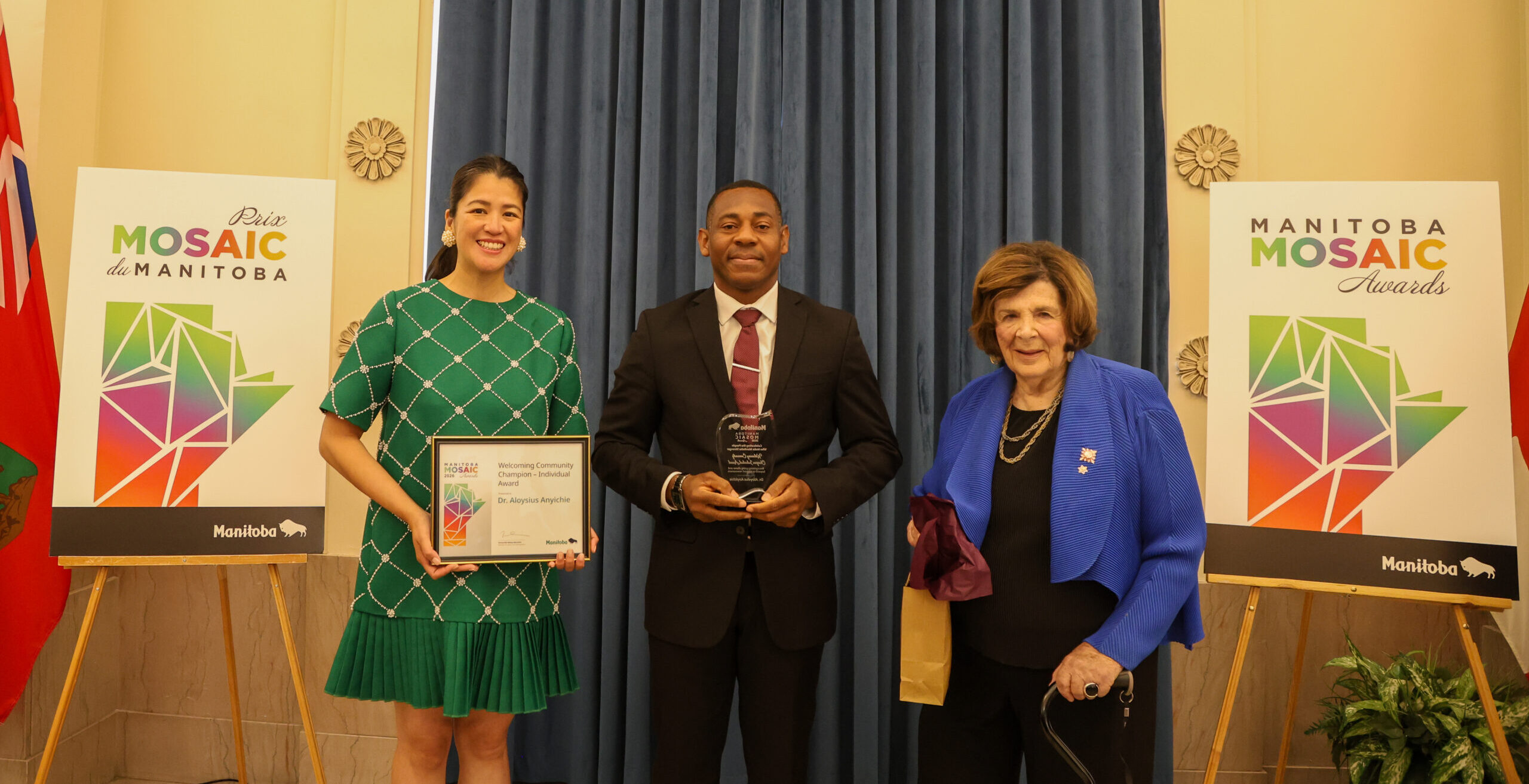 Dr. Aloysius Anyichie with Minister Malaya Marcelino and Lieutenant Governor Anita Neville at the 2026 Manitoba Mosaic Awards.