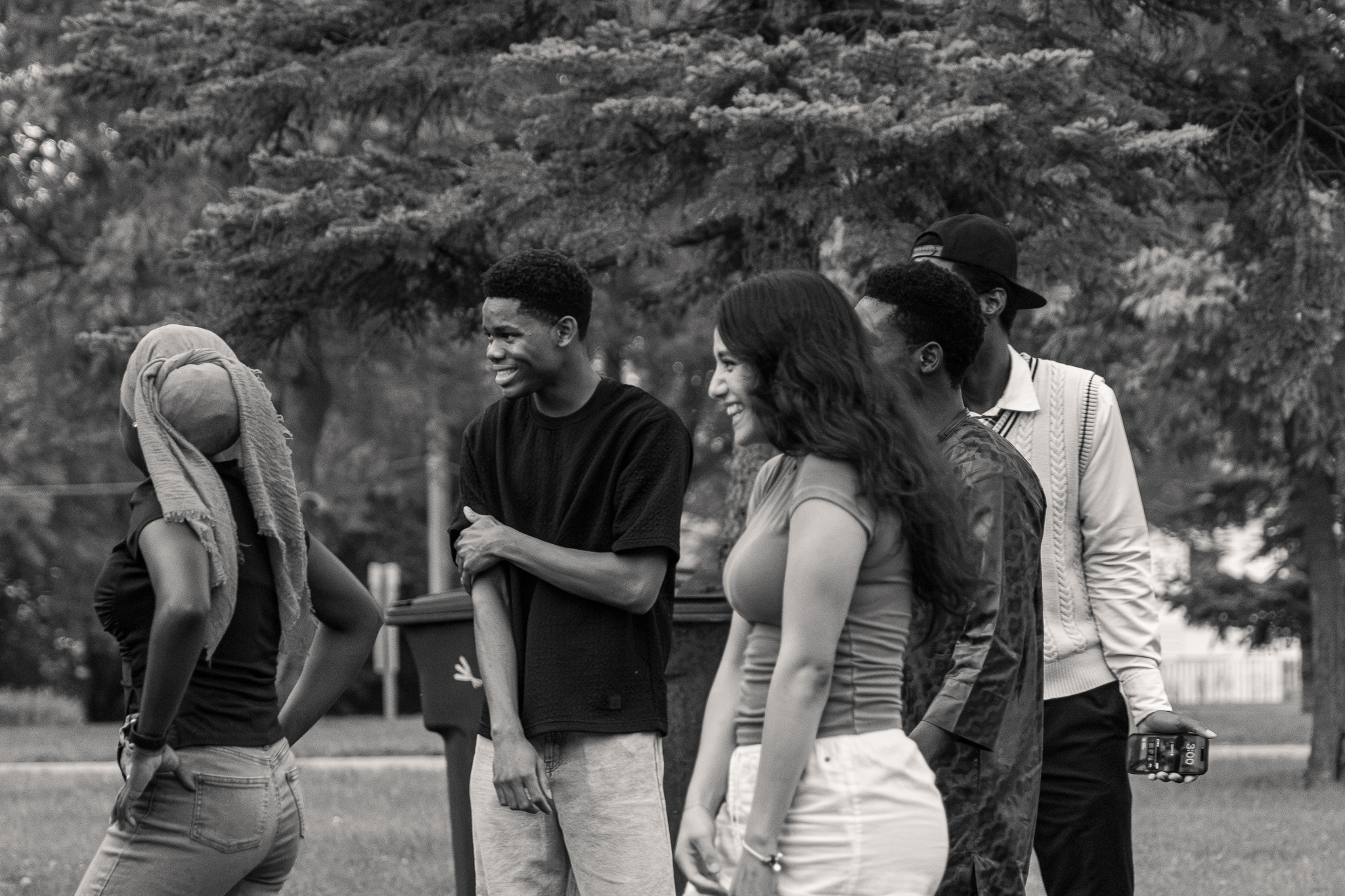 A small group of students excitedly waiting to meet their opponents during a group activity at the 2026 Loy Excellentia Picnic.